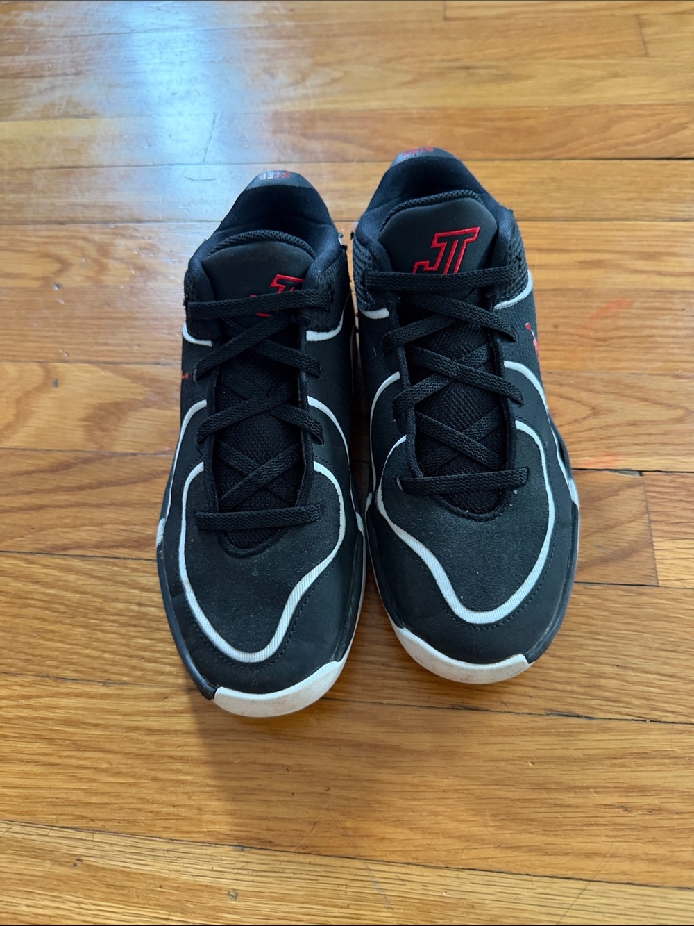 Jordan Kids Black and White Sneakers with Red Accents